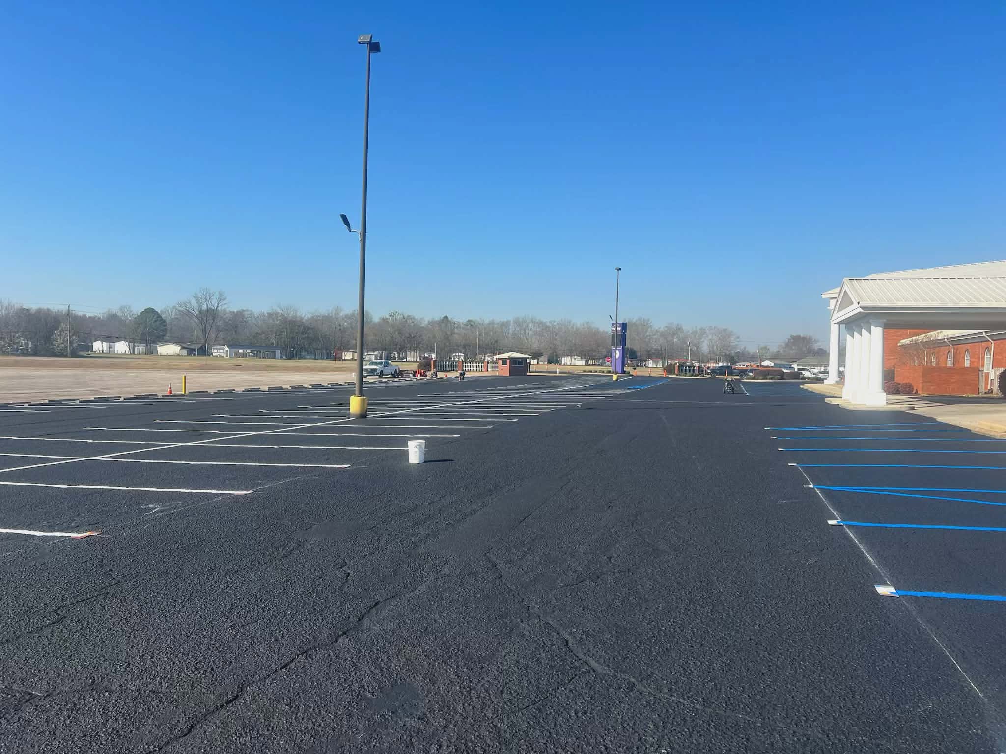 warren asphalt construction inc - parking lot repaving - re do a parking lot with new stripes - warren striping birmingham al - manuel warren owner