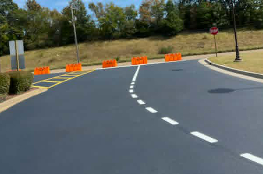 warren-asphalt-striping-parking-lot-striping-birmingham compliance safety insured bonded warren striping government contractor WHITE STRIPING ROADWAY BIRMINGHAM AL