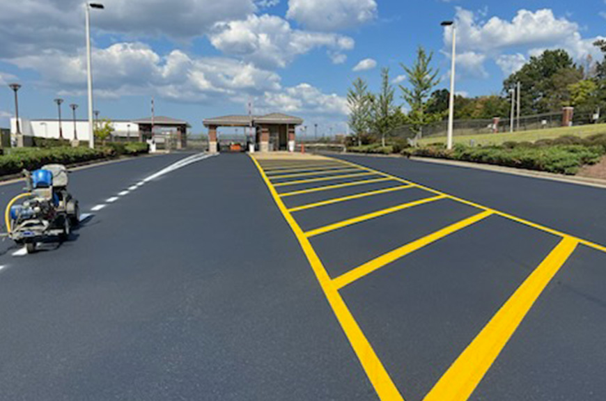 warren-asphalt-striping-parking-lot-striping-birmingham compliance safety insured bonded warren striping government contractor YELLOW STRIPING